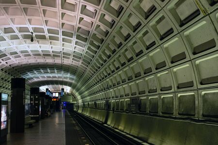 Washington DC, USA - June 9, 2019: Passengers are waiting for the next Metro train at Capitol South...