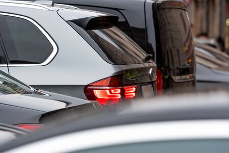 modern cars stands in traffic jam  in rush hour - image