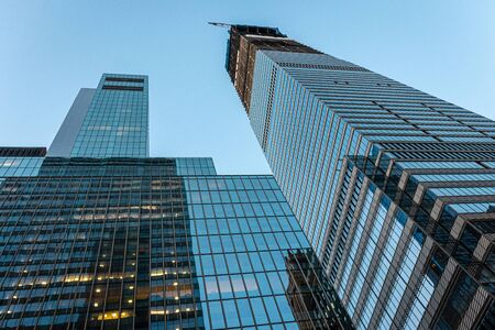 New York, USA - June 22, 2019: Low angle view of skyscrapers in the Financial District of New York, USA - Imageのeditorial素材