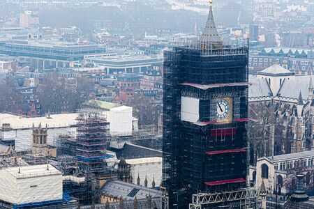 Big Ben clock in London maintenance repairs. Famous clock tower in England under construction, London, UK - imageのeditorial素材