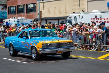 New York, USA - June 22, 2019: Participants riding car during the Annual Mermaid Parade at Coney...