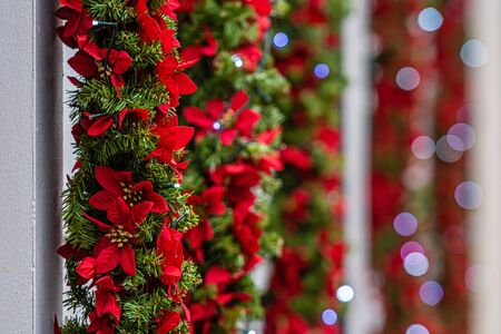 Christmas lights and decorations on the facade of the building, Selective focus, defocused Christmas background の写真素材