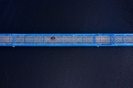 top down aerial view to the bridge over the river Lielupe near Kalnciems, Latviaの写真素材