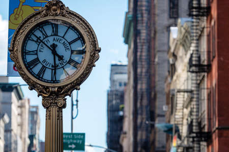New York, USA - June 21, 2019: historic clock on the Fifth Avenue, at the intersection with Broadwayのeditorial素材