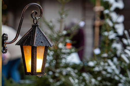Medieval lanterns with spruce branches at Christmas market. Riga, Latvia - imageの写真素材
