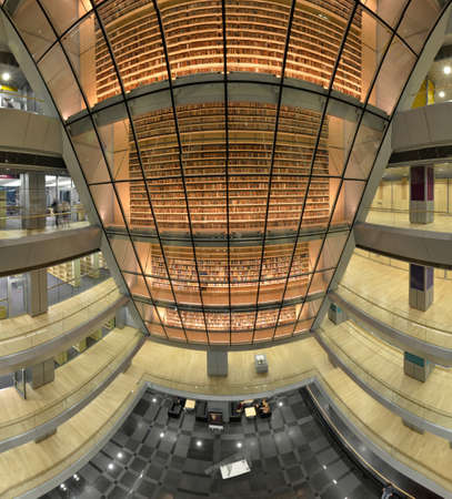 Riga, Latvia - October 31, 2014: National library, Atrium, background of paper books that fill...