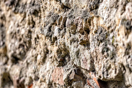 decorative exterior wall plaster with embossed surface, selective focusの写真素材