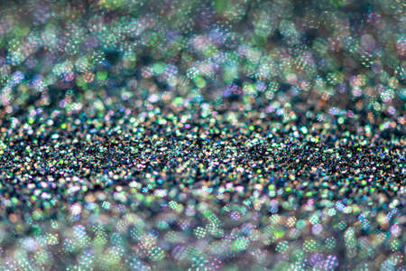 abstract of colorful and sparkling bokeh background, blurred lighting from glitter texture, soft focusの写真素材