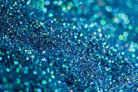 abstract of bright and sparkling bokeh background, blue, green and silver bokeh, soft focusの写真素材