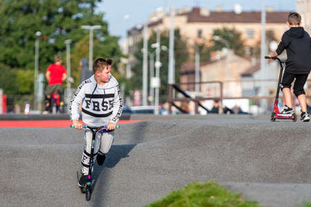 Riga, Latvia - September 30, 2020: the teenage in the skatepark carries out various tricks with bicyclesのeditorial素材