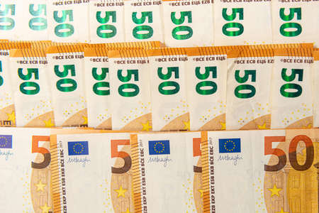 background from 50 euro banknotes, Euro banknote as part of the economic and trading system, Close-upの写真素材