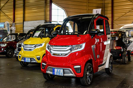 Riga, Latvia, September 25, 2020: DT Motor Power One mini electric cars at a motor show