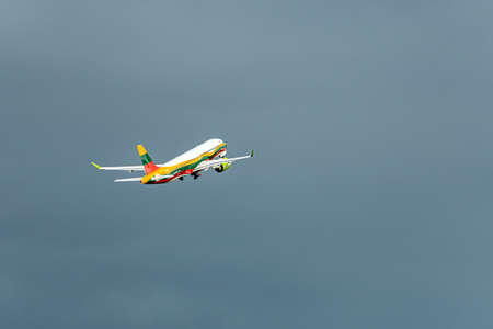 Riga, Latvia - August 19, 2021: AirBaltic Airbus A220-300 YL-CSK aircraft in the colors of Lithuania...