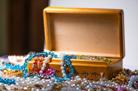 jewelry box, pearl beads and various other multicolored jewelry, selective focus, prosperity conceptの写真素材