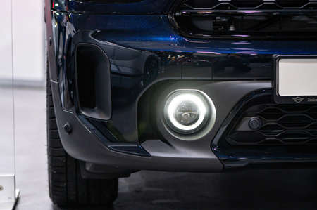 Riga, Latvia, Sep 24, 2021: fog light in the front bumper of the Mini Countryman Plug-In Hybrid, closeupのeditorial素材
