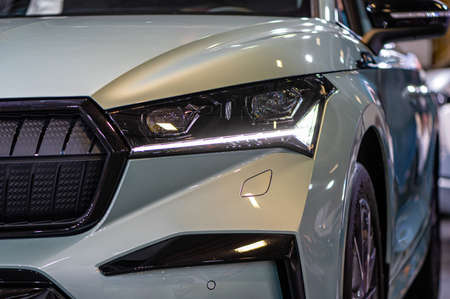 Riga, Latvia, Sep 24, 2021: Skoda Enyaq IV electric SUV premiere at a motor show, full LED...