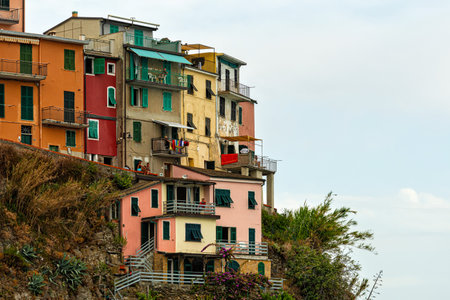 colorful buildings and old facade with windows in small village Manarola Cinque terre in liguriaのeditorial素材