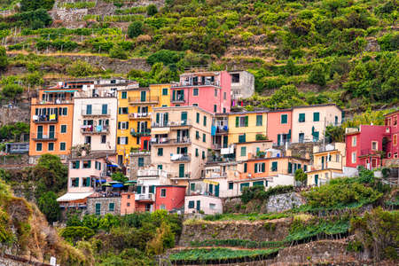 colorful buildings and old facade with windows in small village Manarola Cinque terre in liguriaのeditorial素材