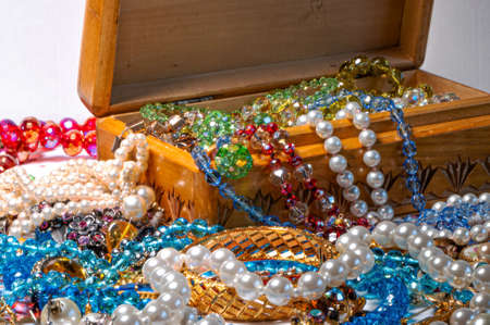 jewelry box, pearl beads and various other multicolored jewelry, selective focus, prosperity conceptの写真素材