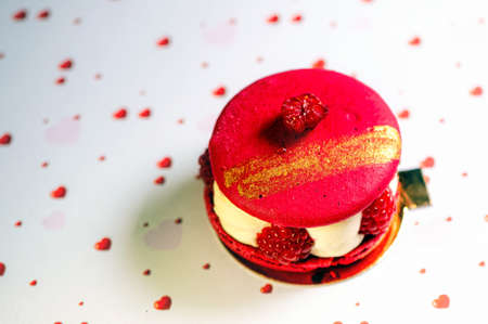 homemade cake with raspberries and sour cream on a white background with hearts, closeupの写真素材