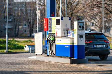 Riga, Latvia, November 2, 2021: Gas filling point with payment terminal of Neste fuel station, Neste is an unmanned petrol stationのeditorial素材