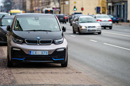 Riga, Latvia, November 2, 2021: BMW i3 electric car is parked on a city street, the i3 is BMW first zero-emission electric vehicleのeditorial素材