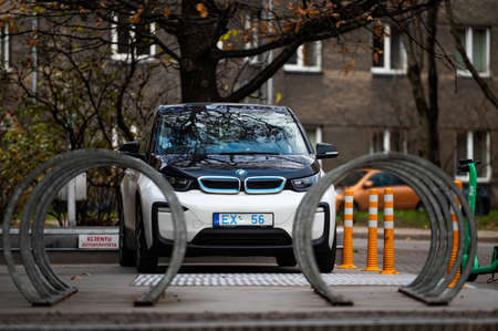 Riga, Latvia, November 2, 2021: BMW i3 electric car is parked on a sidewalk, the i3 is BMW first zero-emission electric vehicleのeditorial素材