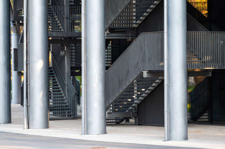 stairs with metal steps and railings leading upwards, an element of urban architecture