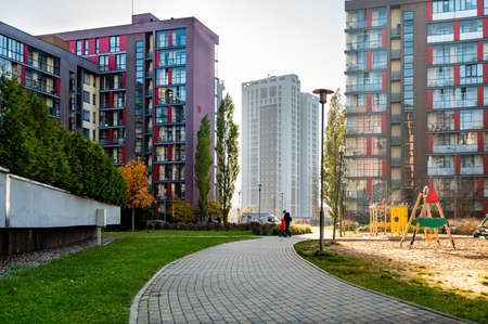 Riga, Latvia, October 29, 2021:  modern yard of a residential quarter with a childrens playground in Purvciems districtのeditorial素材