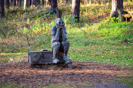 Riga, Latvia, October 30, 2021: punk sitting on a radio, sculpture by Lithuanian sculptor Tautvils Povilonis, placed in Mezaparksのeditorial素材