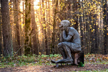 Riga, Latvia, October 30, 2021: punk sitting on a radio, sculpture by Lithuanian sculptor Tautvils Povilonis, placed in Mezaparksのeditorial素材
