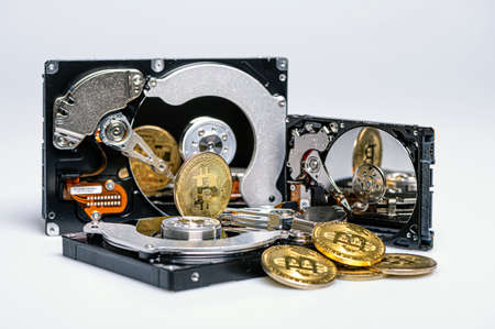 Bitcoin BTC on Hard Disk Drive, Hard drive with crypto currency, Digital money concept