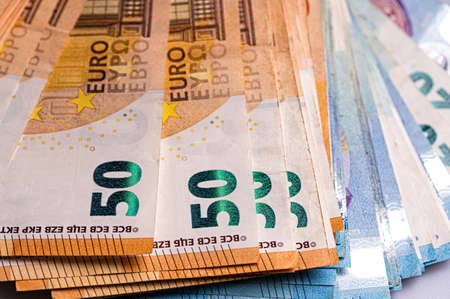 Money background from 50 and 20 euro banknotes. Euro banknote close-upの写真素材