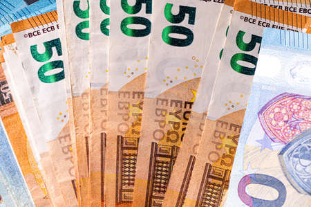 Money background from 50 and 20 euro banknotes. Euro banknote close-upの写真素材