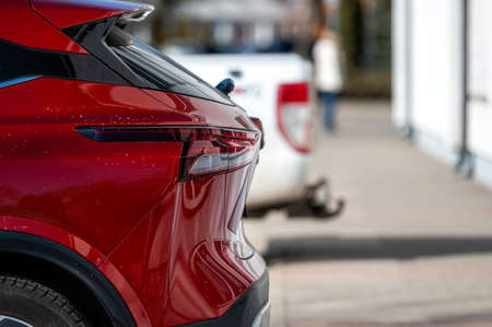 Close-up of tail lights of cars standing in a row, aelective focusの写真素材