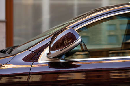 modern luxury car with folded rear view mirrors, closeupの写真素材