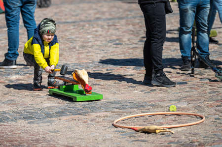 Dobele, Latvia - April 17, 2022: Easter holidays, games for kids in the city square, target hitting gameのeditorial素材