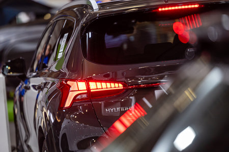 Riga, Latvia, April 29, 2022: lots of new shiny cars, selective focuss, boheh, details, close-up, traffic background, copy spaceのeditorial素材