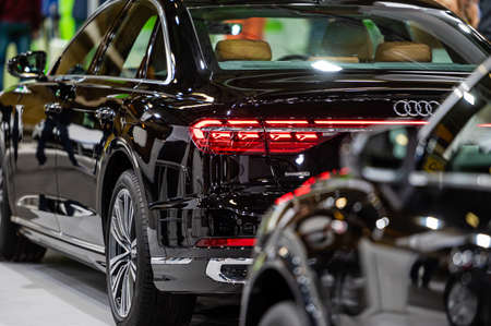 Riga, Latvia, April 29, 2022: A line of expensive, shiny luxury Audi cars, selective focuss...