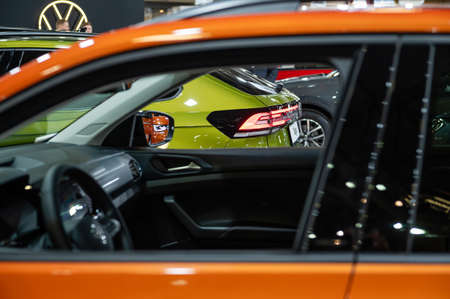 Riga, Latvia, April 29, 2022: lots of new shiny cars, selective focuss, boheh, details, close-up,...