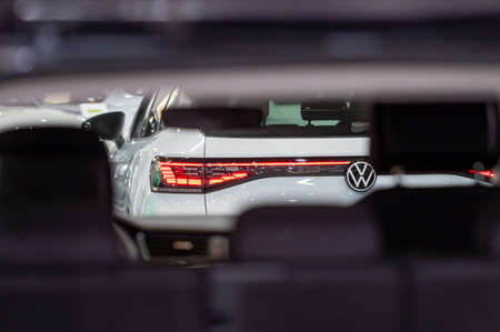 Riga, Latvia, April 29, 2022: lots of new shiny cars, selective focuss, boheh, details, close-up, traffic background, copy spaceのeditorial素材