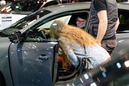 Riga, Latvia, April 29, 2022: people get acquainted with the new model 2022 of vehicle Hyundai i30のeditorial素材