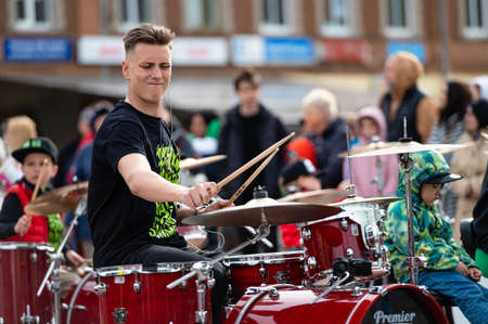 Dobele, Latvia - May 13, 2022: Summit of small drummers in the historical time of Dobele market, Dozens of drummers play various compositions synchronouslyのeditorial素材