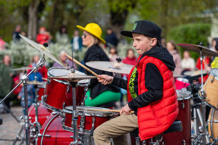 Dobele, Latvia - May 13, 2022: Summit of small drummers in the historical time of Dobele market, Dozens of drummers play various compositions synchronouslyのeditorial素材