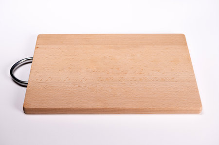 wooden cutting board isolated on white, close-up