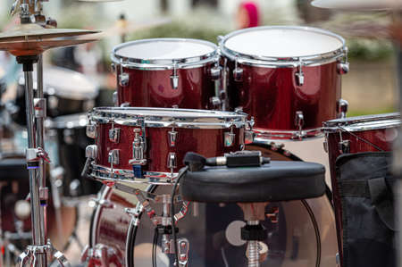 A set of plates in a drum set. At a concert of percussion music, selective focus, close-upの写真素材