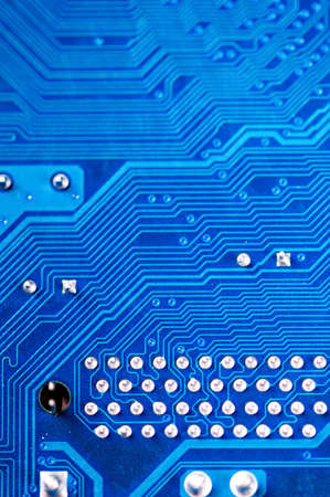 Close up of a printed blue computer circuit board