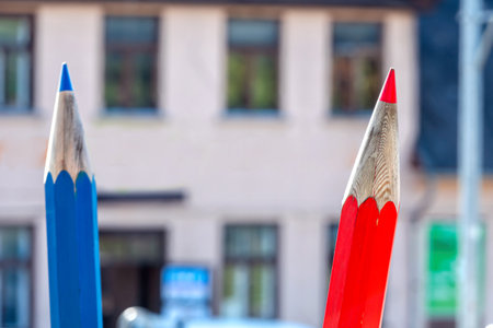 large decorative colored wooden pencils on defocused background, back to school conceptの写真素材
