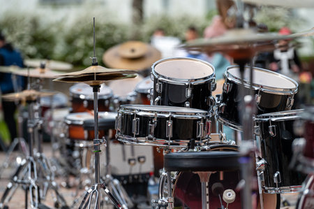 A set of plates in a drum set. At a concert of percussion music, selective focus, close-upの写真素材