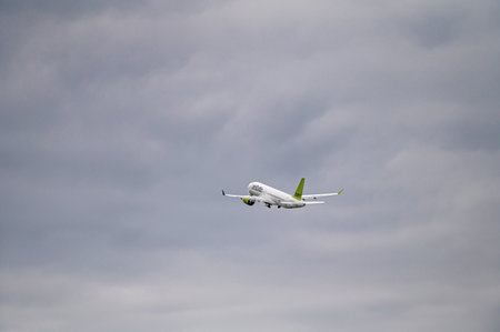 Riga, Latvia - August 31, 2021: AirBaltic Airbus A220-300 YL-AAS takes off from RIX International...